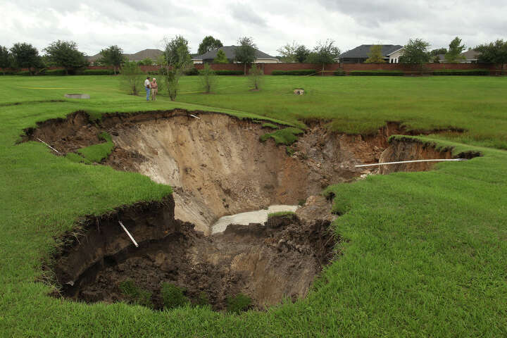 Photos: Massive sinkhole in Japan latest in long list of collapses ...