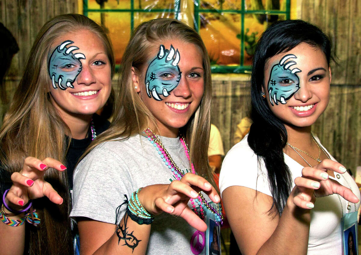 Striking a pose with their newly acquired "rhino eye" face designs are, from left to right, the engaging trio of Gabrielle Scocca, Maggie Heaton and Carla Hernandez during the New Milford High School Grad Party, June 23, 2012 at the school.