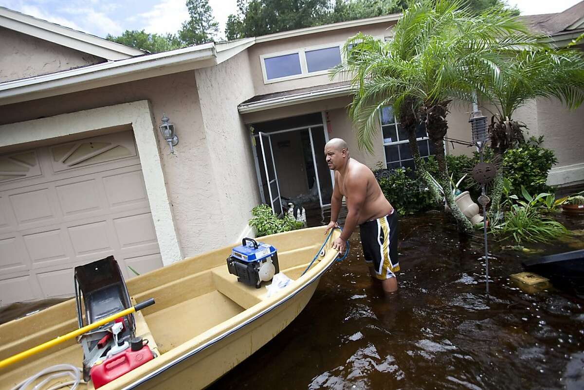 Tropical storm Debby leaves, but flooding remains