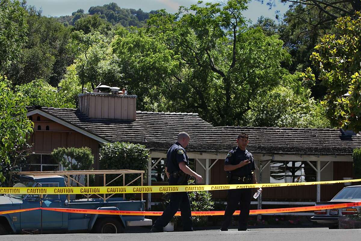 A 51-year-old woman was reported dead around noon today in the kitchen of her residence at 626 Moraga Way in Orinda, Calif., as police investigate the home on Tuesday, June 26, 2012. A 62-year-old male suspect was arrested shortly thereafter.