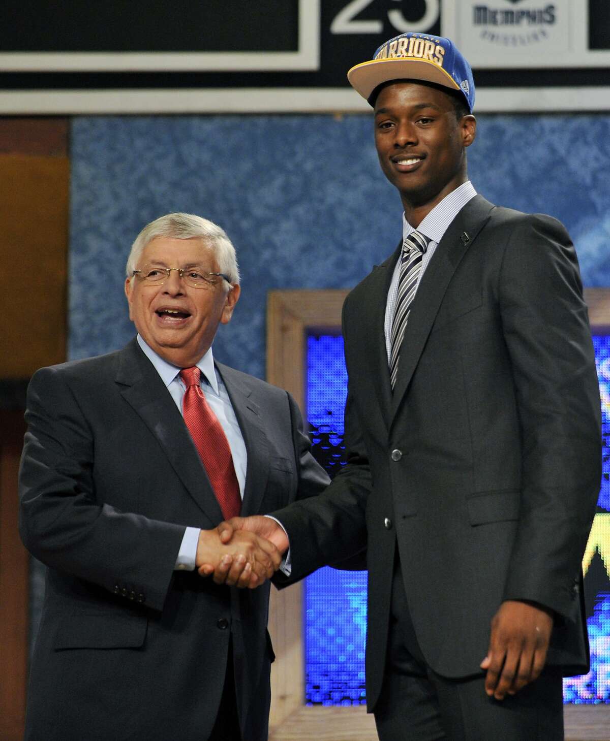 NBA Commissioner David Stern, left, poses with the No. 7 overall draft pick Harrison Barnes, of North Carolina, who was selected by the Golden State Warriors in the NBA basketball draft, Thursday, June, 28, 2012, in Newark, N.J. (AP Photo/Bill Kostroun)