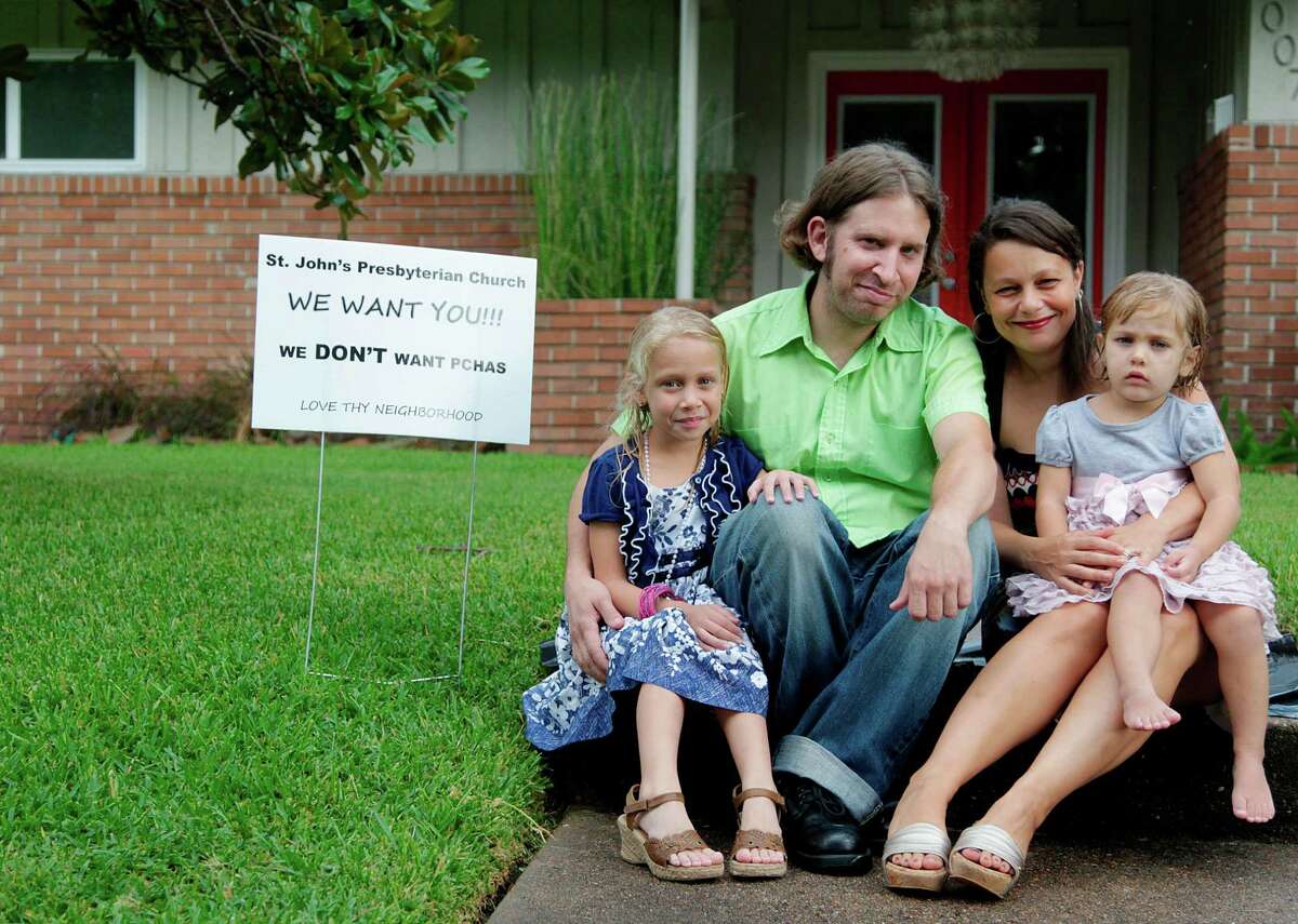 Chad Wilson and his daughters, Naomi, 6; Eden, 3; and wife Nancy, reside in Meyerland. Wilson, a UH professor, says he donates to a women's shelter downtown but opposes a similar one in his neighborhood.