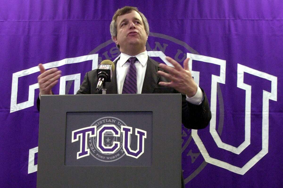 KRT SPORTS STORY SLUGGED: FBC-TCU KRT PHOTOGRAPH BY JESSICA KOURKOUNIS/FORT WORTH STAR-TELEGRAM (DALLAS OUT) (January 30) FORT WORTH, TX -- Eric Hyman, Texas Christian University Athletics Director, speaks about his desire for stability at a press conference on Friday, January 30, 2004, announcing that the University has accepted an invitation to become the ninth member of the Mountain West Conference beginning with the 2005-06 season. (nk) 2004. HOUCHRON CAPTION (02/02/2005) SECSPTS: HYMAN.