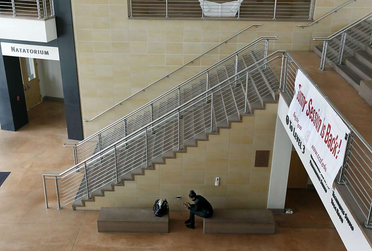 A student sits on the ground level of the Wellness Center on the main CCSF campus in San Francisco, Calif. on Friday, June 29, 2012.