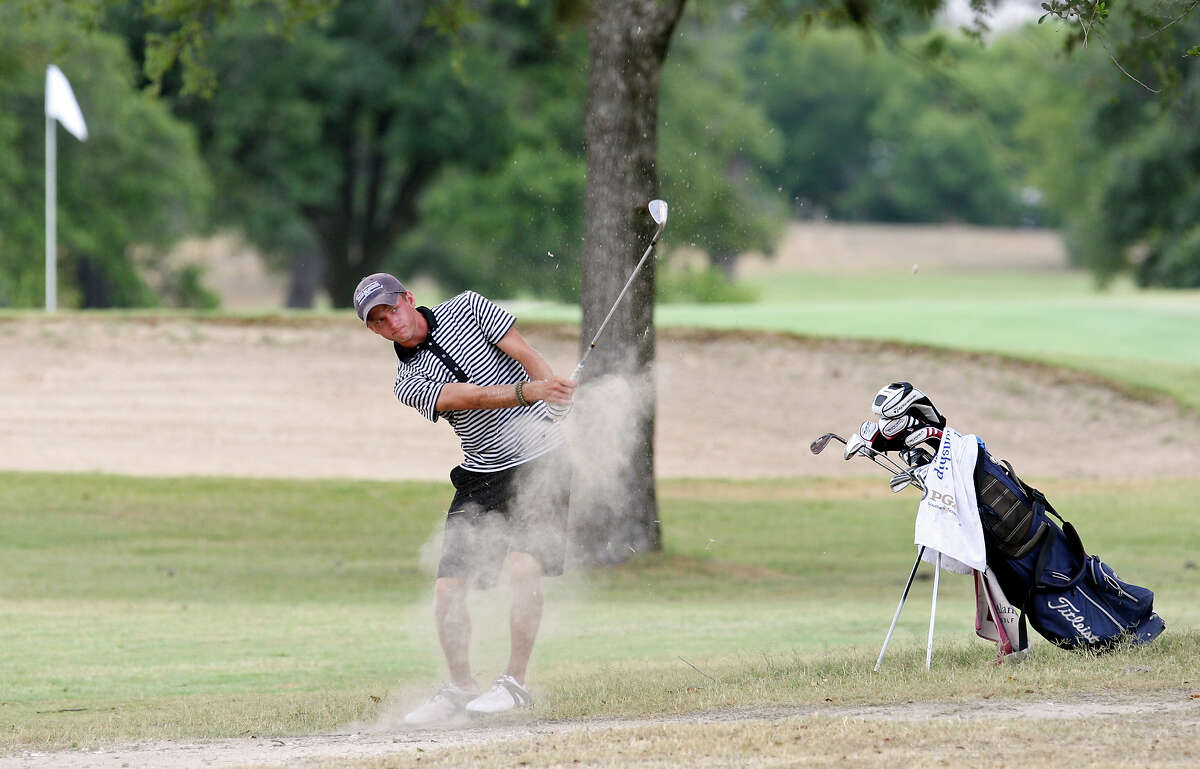 O'Connor senior J.C. Stoddard hits his approach shot on No. 16 during the Greater San Antonio Junior Match Play Championship on Friday, June 29, 2012, at Riverside Golf Course. Alamo Heights freshman Levi Valadez defeated Stoddard 4 and 2 to win the event.