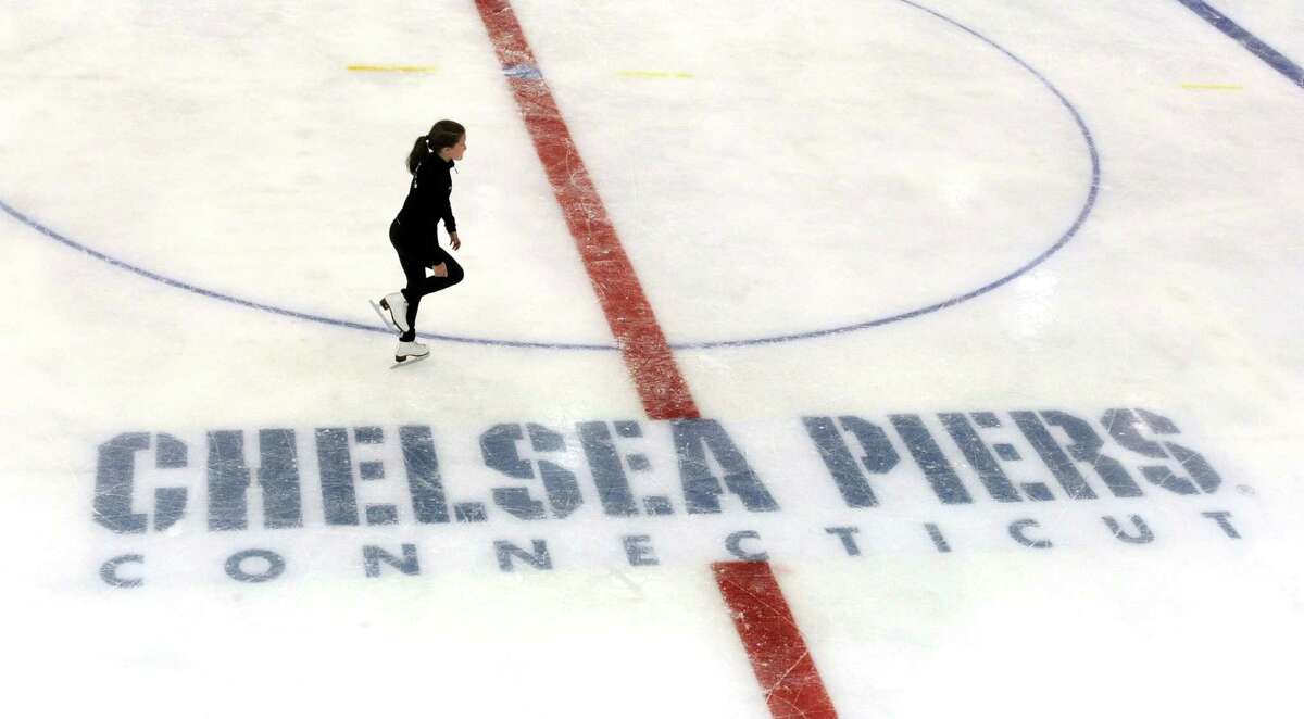 A skater practices on one of the two ice rinks at Chelsea Piers Connecticut. The Stamford, Conn. facility held their ceremonial ribbon cutting at their Blachley Road campus on Thursday June 28, 2012.
