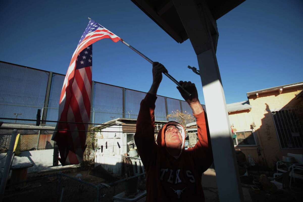 "I believe 100% we need it," says Navy veteran Jesus Maldonado, 69, in regards to the U.S. Mexico border fence towering over his backyard in the Chihuahuita neighborhood on Tuesday, March 20, 2012, in El Paso. "Ever since they put that fence in, you can sleep," says Maldonado who could hear people on his roof at night who were trying to illegally enter the country. El Paso's historic neighborhood of Chihuahuita is safer according to residents who say the fence is keeping out undocumented immigrants and smugglers who sprinted across the border.