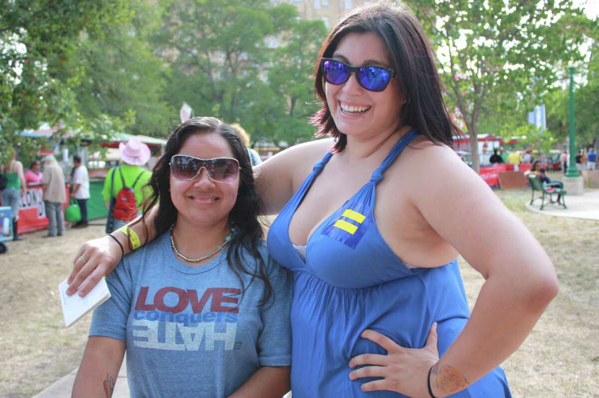 Revelers supporting San Antonio's gay, lesbian, bi and transgendered community attend the Pride Bigger Than Texas block party and parade on Saturday, June 30, 2012 near San Antonio College.