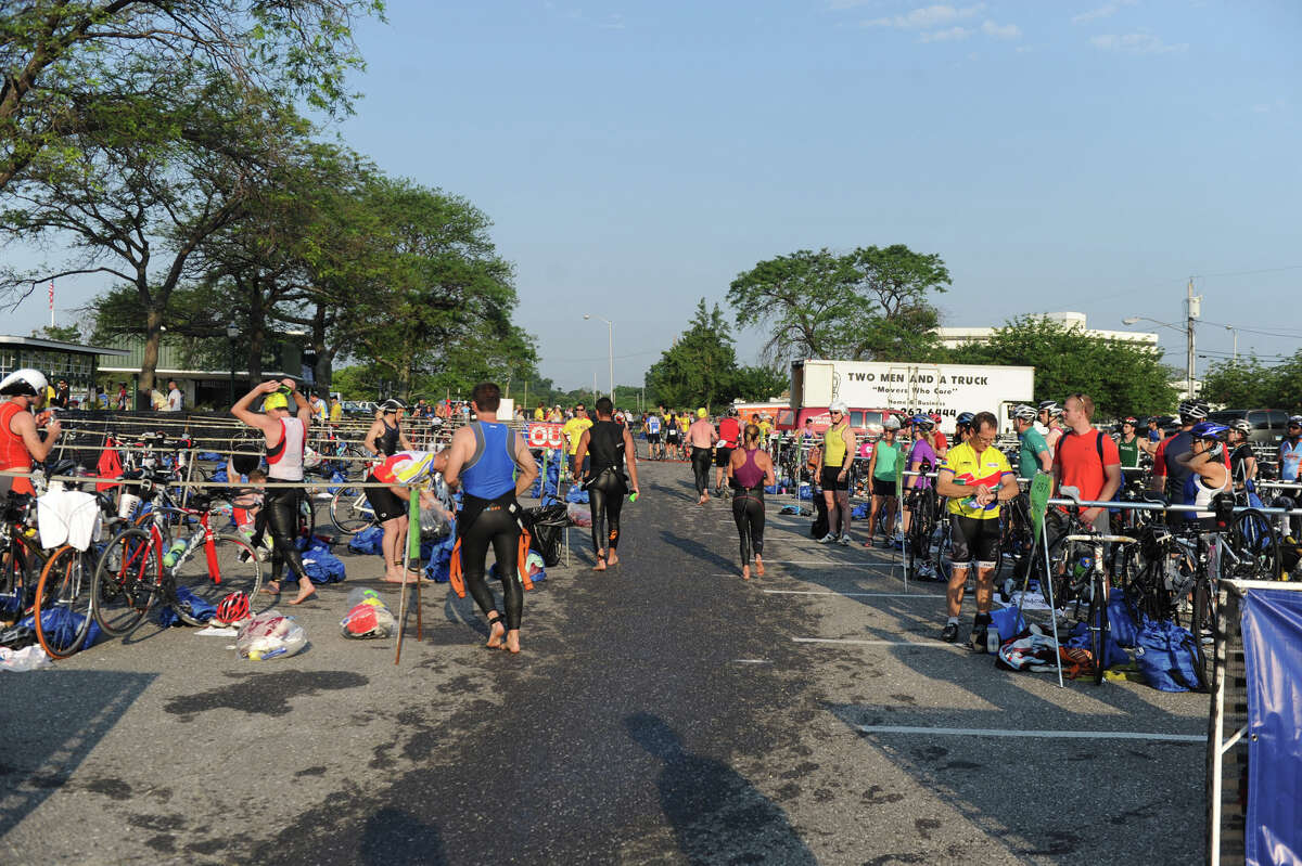 Triathletes grind it out for kids' shelter