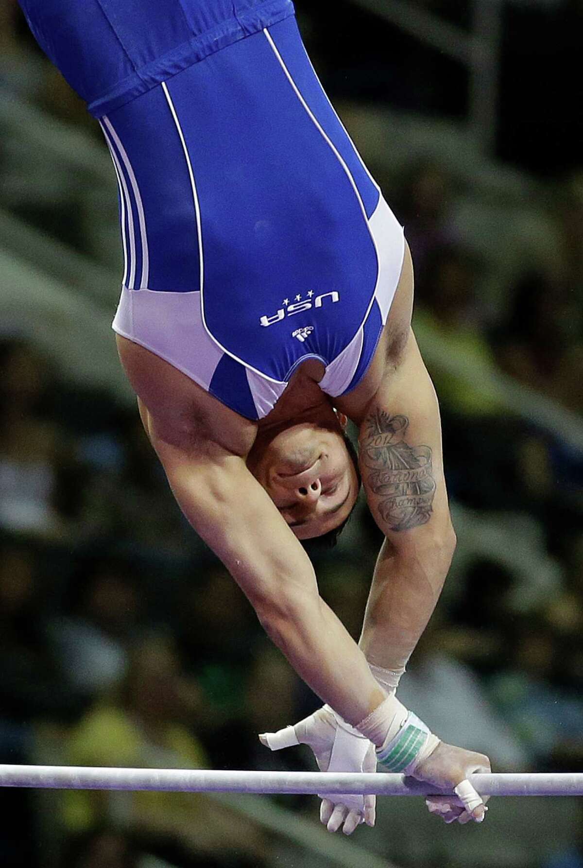 Sam Mikulak competes on the horizontal bar during the preliminary round of the men's Olympic gymnastics trials Thursday, June 28, 2012, in San Jose, Calif. (AP Photo/Jae C. Hong)