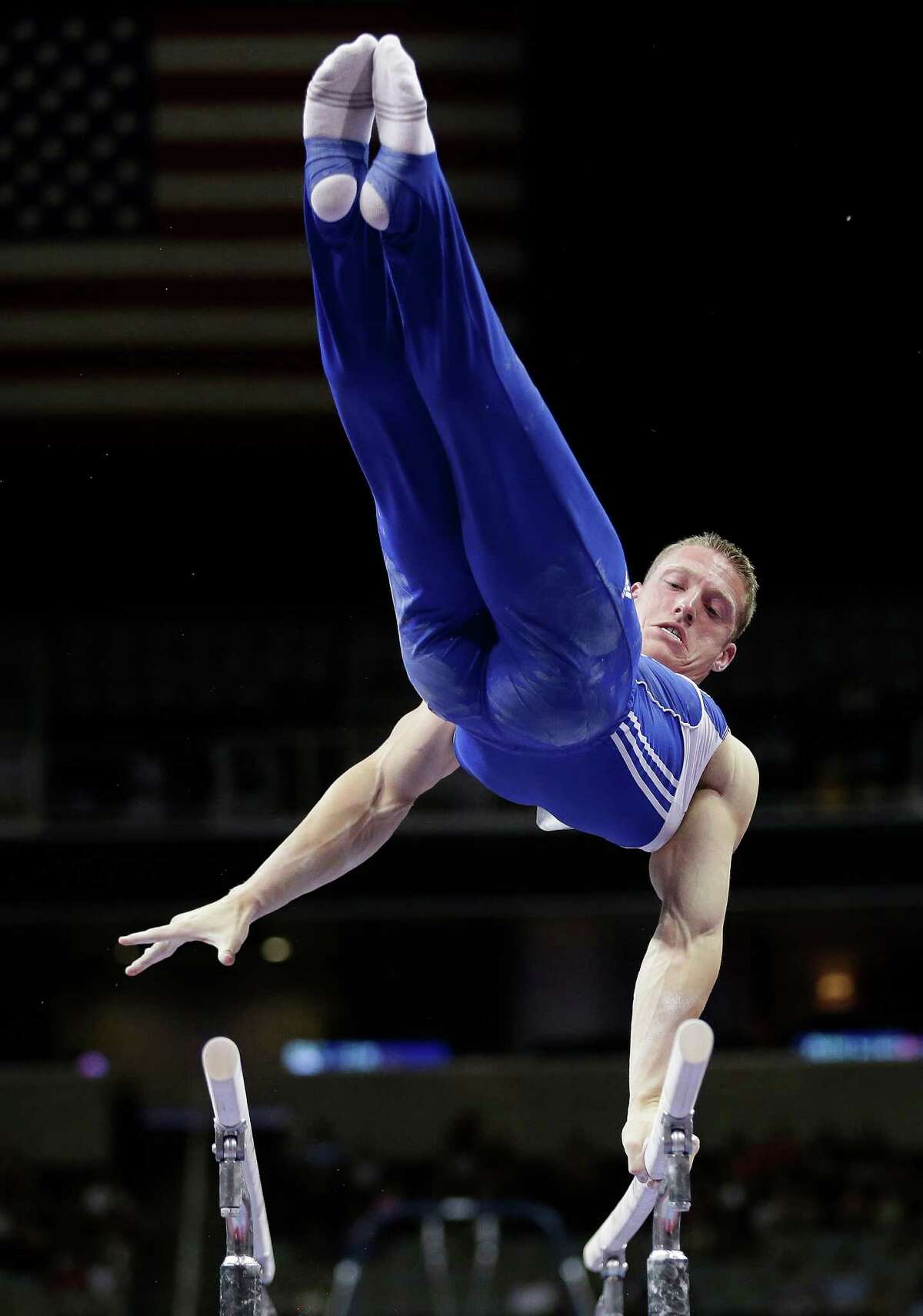 Steve Legendre competes on the parallel bars during the preliminary round of the men's Olympic gymnastics trials Thursday, June 28, 2012, in San Jose, Calif. (AP Photo/Gregory Bull)
