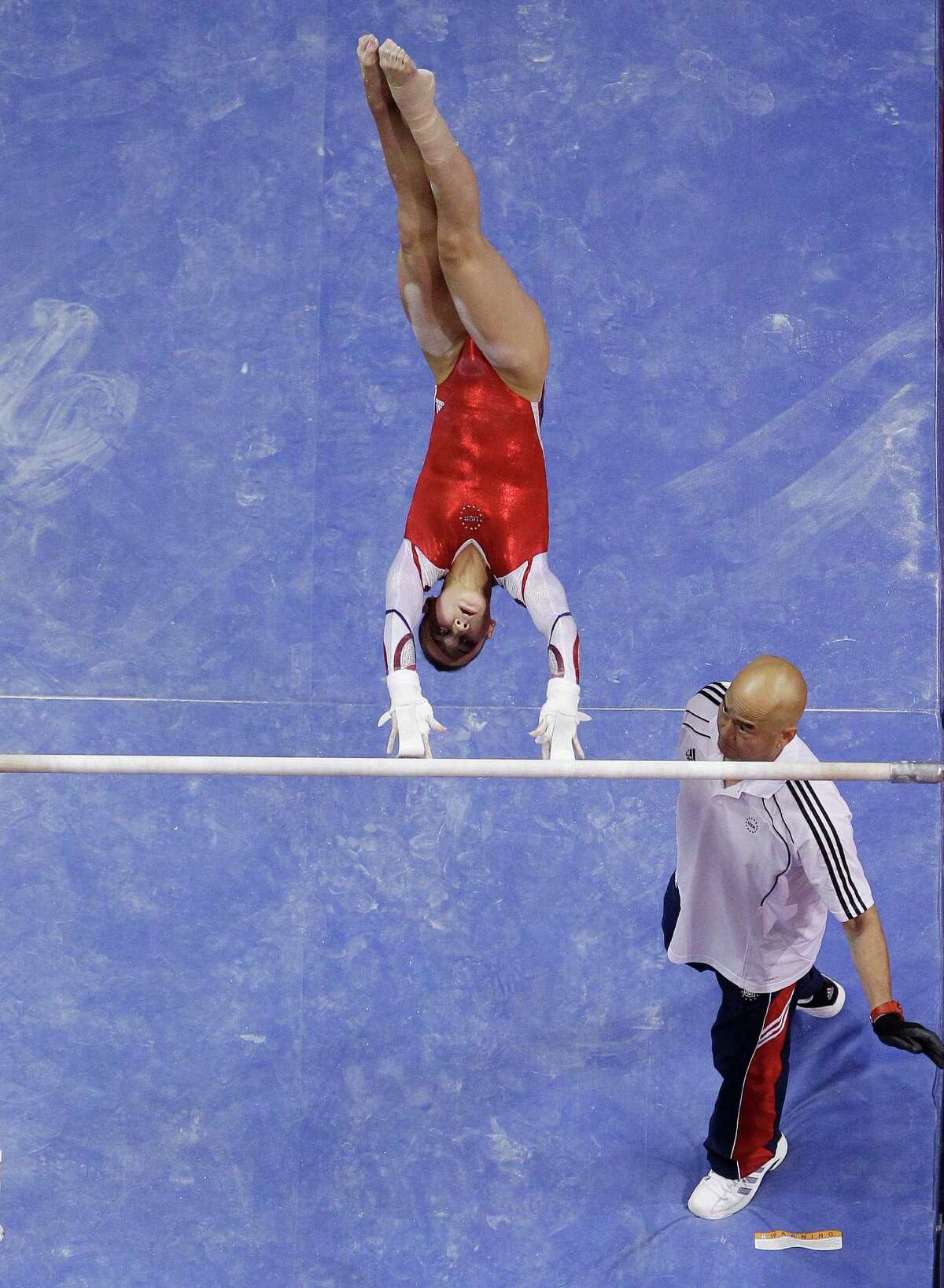 Sarah Finnegan competes on the uneven bars during the final round of the women's Olympic gymnastics trials, Sunday, July 1, 2012, in San Jose, Calif. Finnegan was named to the U.S. Olympic gymnastics team. (AP Photo/Julie Jacobson)