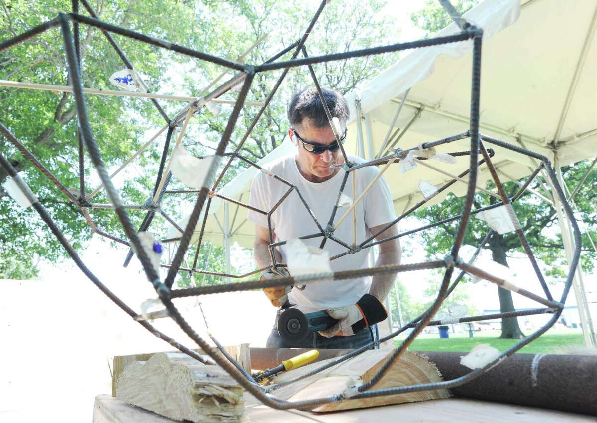 Swedish artist Michael Hedman creates a steel sculpture in Roger Sherman Baldwin Park in Greenwich, Friday, June 29, 2012. Hedman was part of a small group of artists brought together by Mary Gibbons of Greenwich to create sculptures for the park.