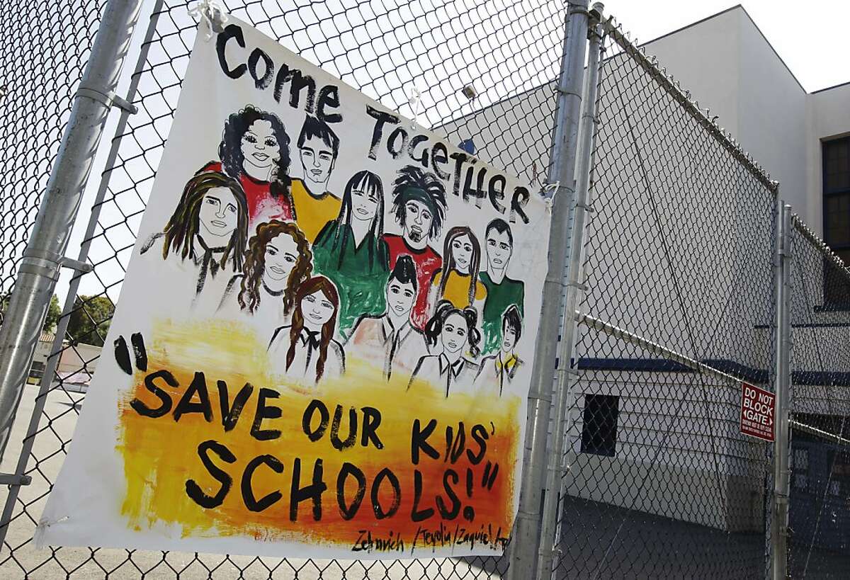 A sign is shown is posted inside of closed Lakeview Elementary School in Oakland, Calif., Tuesday, June 19, 2012 during a protest against school closures. Oakland school district police officers posted notices Monday, the fourth day of the protest, ordering the roughly dozen students, parents and activists on the grounds of Lakeview Elementary School to vacate the premises.