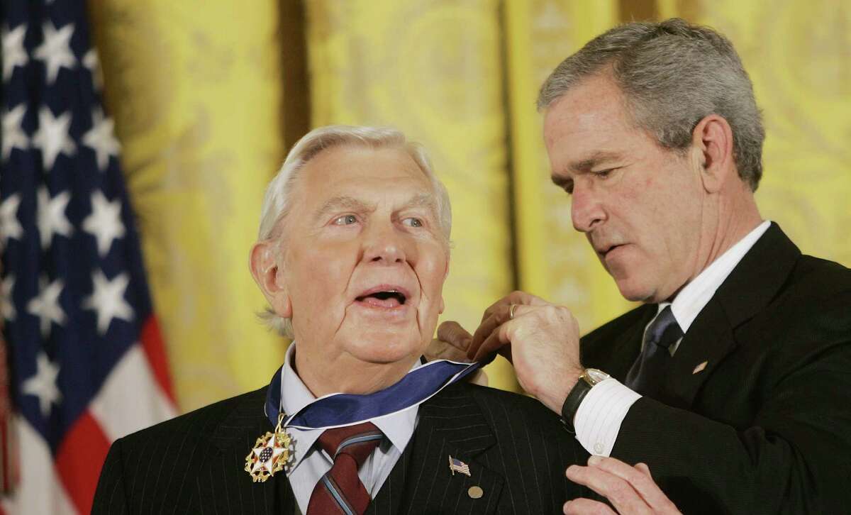 This Nov. 9, 2005 file photo shows President Bush presenting the Presidential Medal of Freedom to actor Andy Griffith in the East Room of the White House.