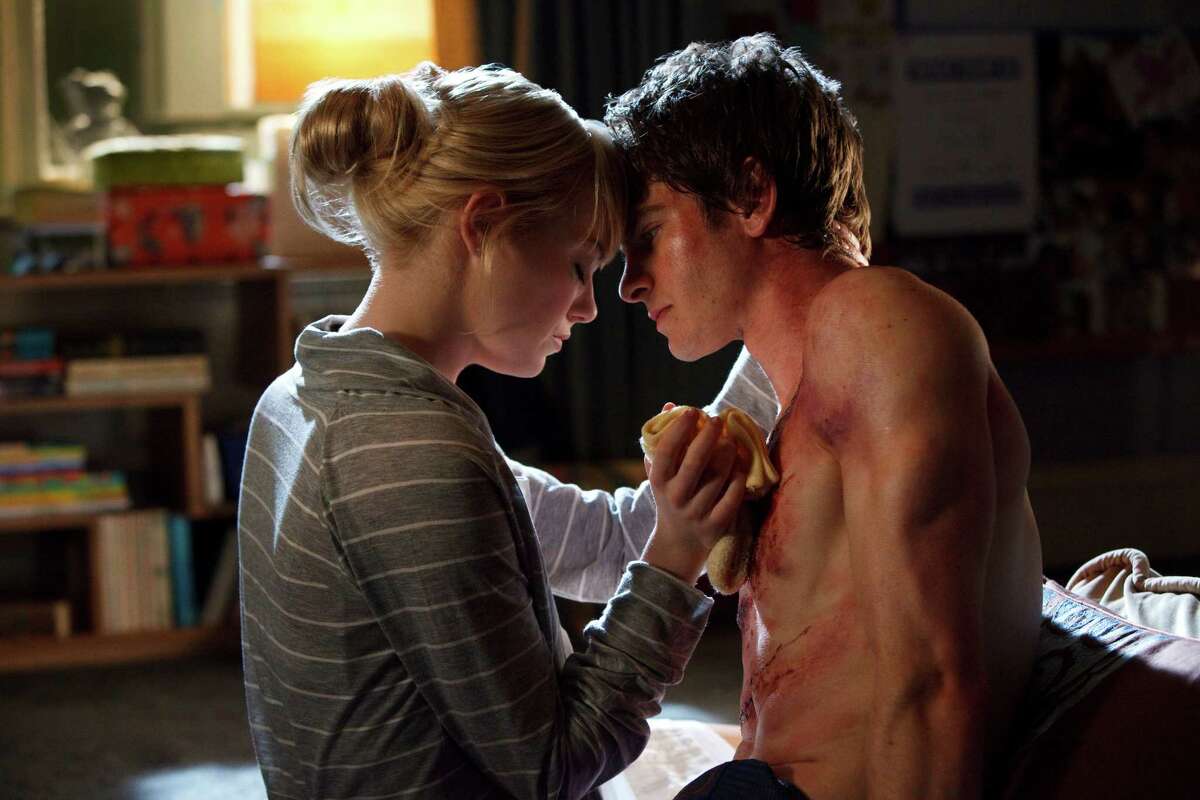 In this film image released by Sony Pictures, Emma Stone, left, and Andrew Garfield are shown in a scene from "The Amazing Spider-Man, set for release on July 3, 2012.