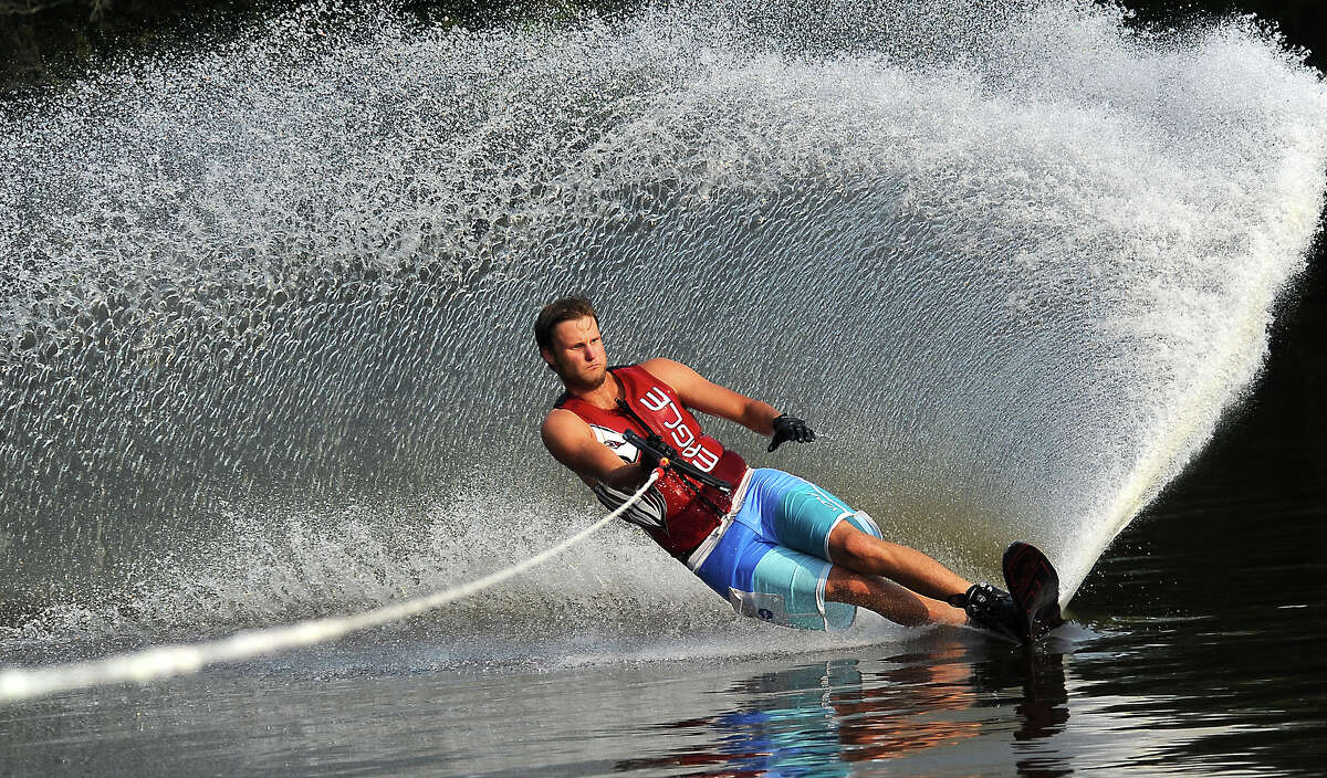 Preston Warner practices water skiing on the Neches River near Collier's Ferry in Beaumont, Wednesday, June 27, 2012. Tammy McKinley/The Enterprise
