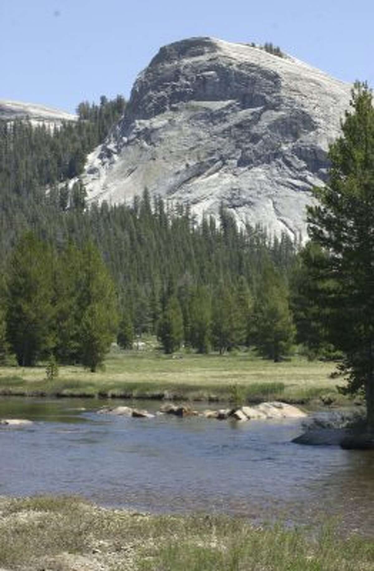 A view of Lembert Dome and the Tuolomne River in Tuolumne Meadows at Yosemite National Park. A rock climber who had just proposed to his girlfriend fell 300 feet to his death while climbing alone in the Tuolumne Meadows on Saturday.