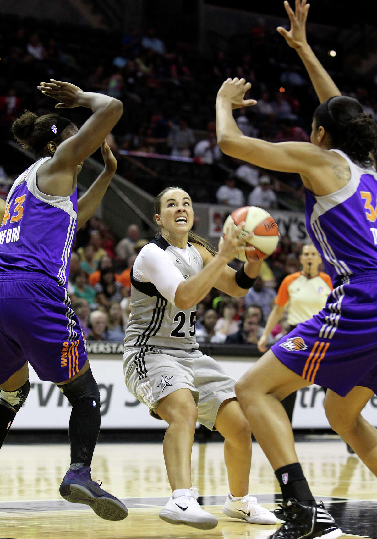 Becky Hammon challenges the lane as the Silver Stars host the Phoenix Mercury at the AT&T Center on July 3, 2012.