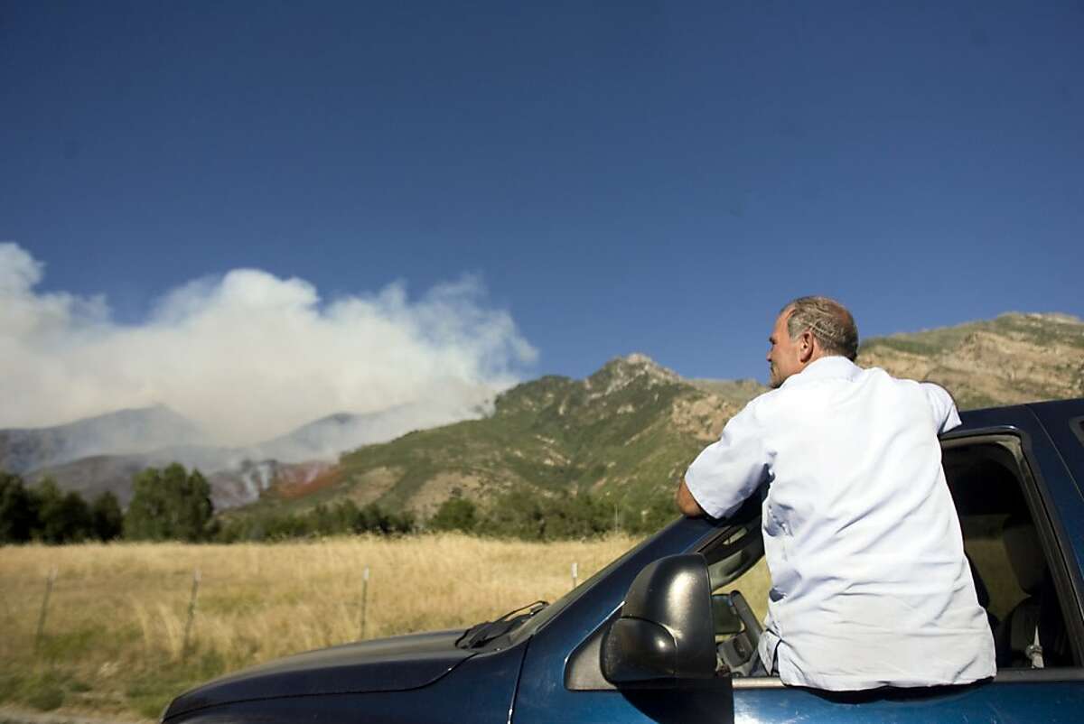 Firefighters in West hope for help from weather