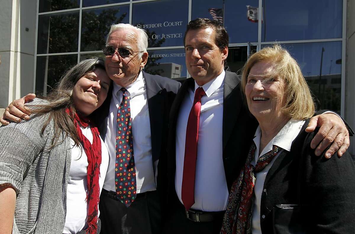 William Lynch (second from right) celebrates his acquital on felony assault charges with his sister Amanda, father John and mother Peggy at the Hall of Justice in San Jose, Calif. on Thursday, July 5, 2012. The jury returned a hung verdict on a simple assault charge. Lynch was accused of assaulting Jerry Lindner, a priest who Lynch says sexually molested him as a boy.