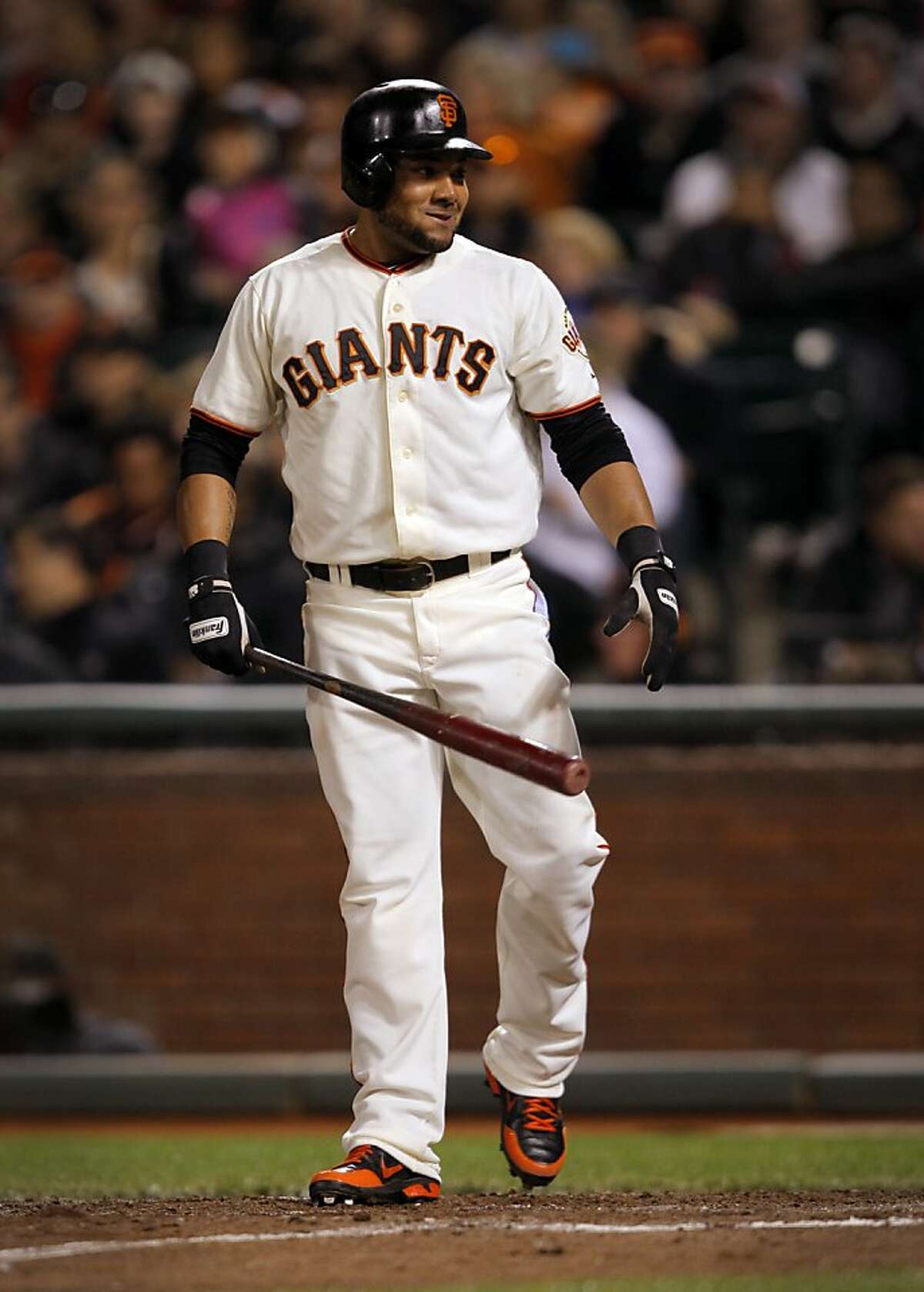 San Francisco Giants left fielder Melky Cabrera smiles while up to bat during their game against the Diamondbacks in San Francisco, Calif. Wednesday, May 30, 2012. Cabrera tied a Giants record for most hits in a month with 51.