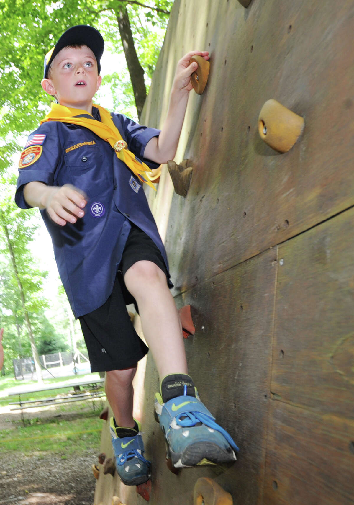 Greenwich Cub Scout Carter Simko, 8, navigates a climbing wall at the Ernest Thompson Seton Reservation in Greenwich, Thursday, July 5, 2012. The Greenwich Council of the Boy Scouts of America is located at the reservation and is celebrating its 100th anniversary July 12.