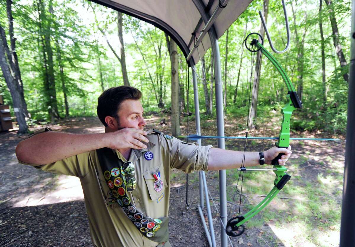 Greenwich Eagle Scout Derik Norrgard, 18, shoots an arrow at the archery range at the Ernest Thompson Seton Reservation in Greenwich, Thursday, July 5, 2012. The Greenwich Council of the Boy Scouts of America is located at the reservation and is celebrating its 100th anniversary July 12.