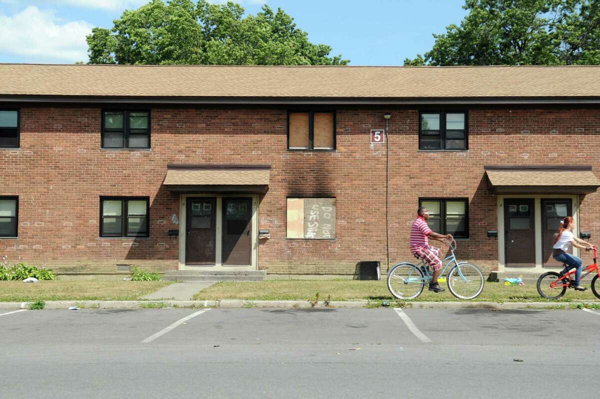 Woman rescues baby from Troy apartment fire