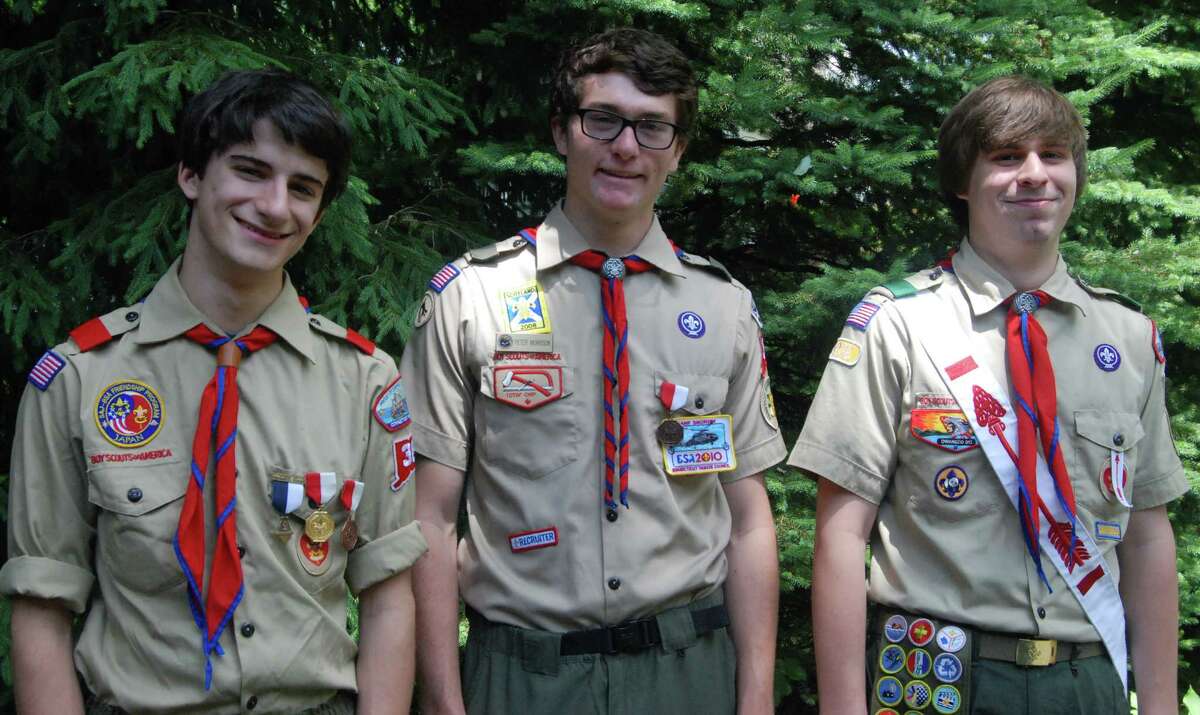 Awarded Eagle Scout badges by Troop 36 during recent ceremonies were, from left Andrew Allison-Godfrey, Peter Morrison and Devon Gillespie.