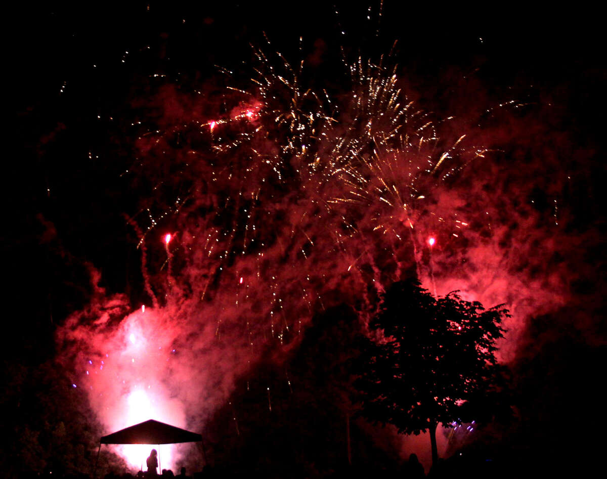 Brilliant fireworks light up the sky over the Shepaug River valley Wednesday as the town of Washington hosts its annual Fourth of July picnic and fireworks show on the campus at Shepaug Valley High School. July 4, 2012