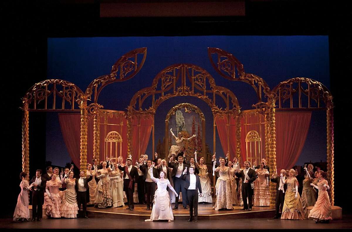 Soprano Rebecca Davis (l.) and tenor Andrew Whitfield in the Festival Opera's 2011 production of Verdi's "La Traviata"