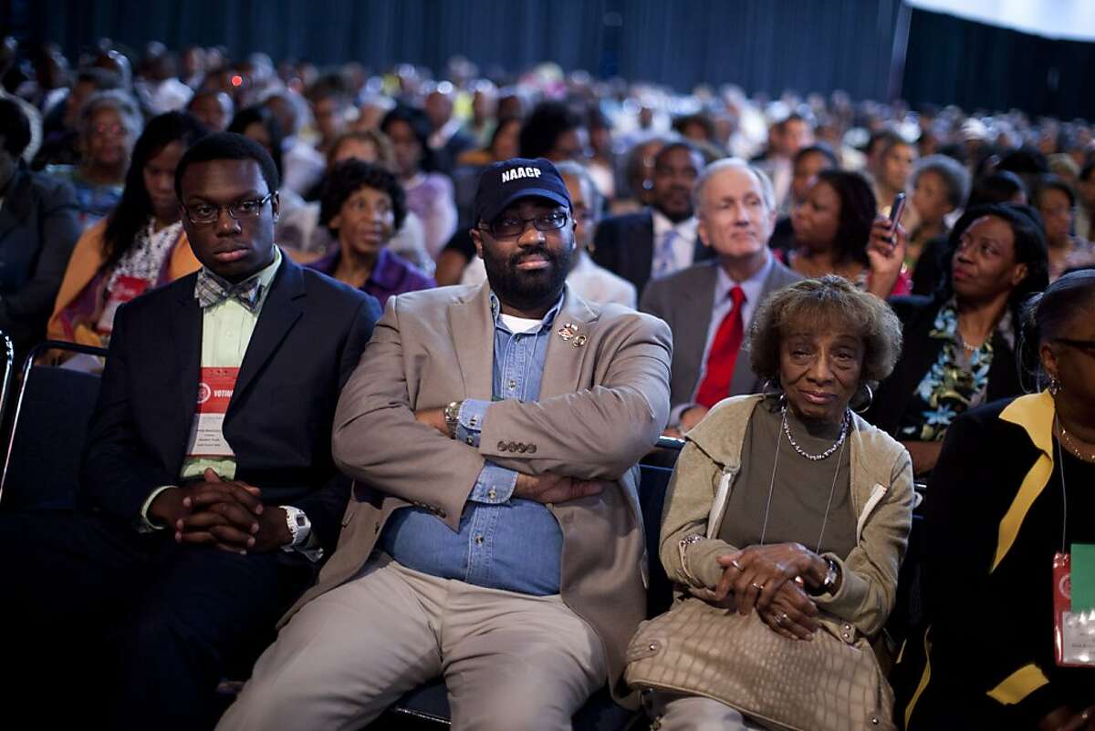 Participants listen to Republican presidential candidate, former Massachusetts Gov. Mitt Romney deliver a speech during the NAACP annual convention on Wednesday, July 11, 2012 in Houston, Texas. (AP Photo/Evan Vucci)