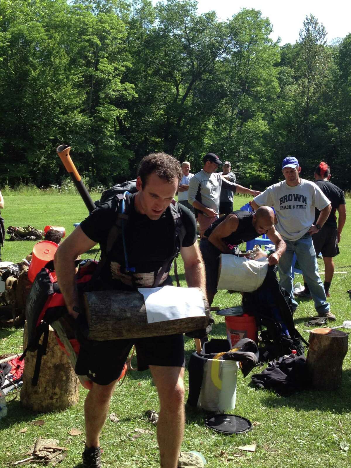 Dennis Sukholutsky participates in the Spartan Death Race, held June 15, 2012 in Pittsfield , Vt. He had to carry the log up the trail, rather than roll it because he was not allowed to get the piece of paper stapled to it dirty.