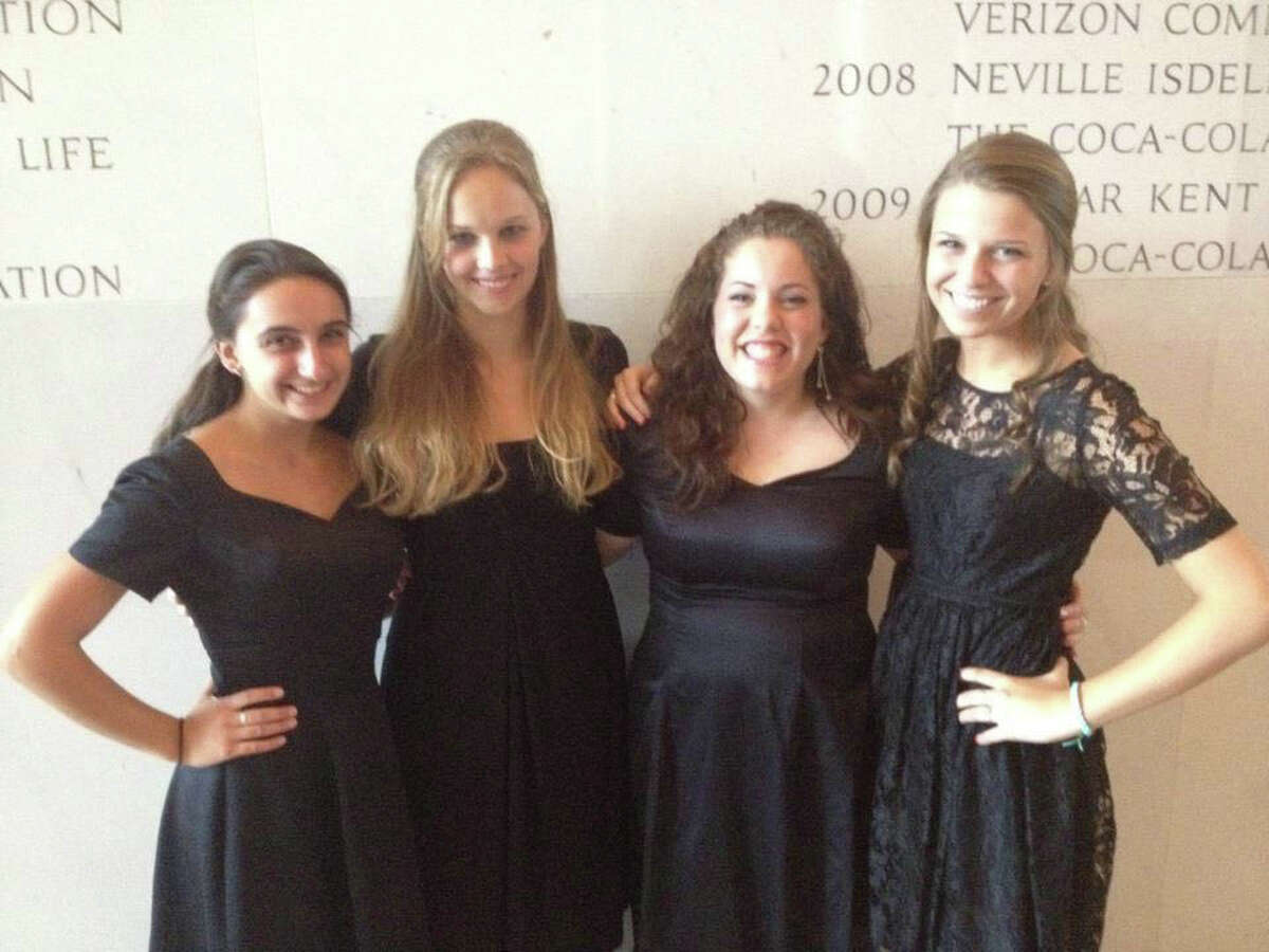 Hannah Caldwell, third from left, is the first Darien student to perform with the All-National Honors Chorus in Washington, D.C. She is pictured with fellow chorus members. July 13, 2012, Darien, Conn.