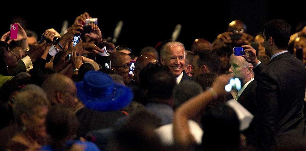 Vice President Joe Biden greets participants after addressing the NAACP annual convention, Thursday, July 12, 2012, in Houston. (AP Photo/Houston Chronicle, Johnny Hanson)
