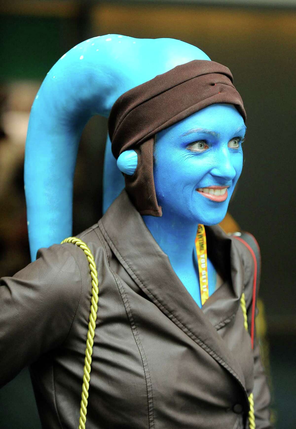 Spencer, dressed as a Twi'lek from Star Wars movies, walks into the ex...