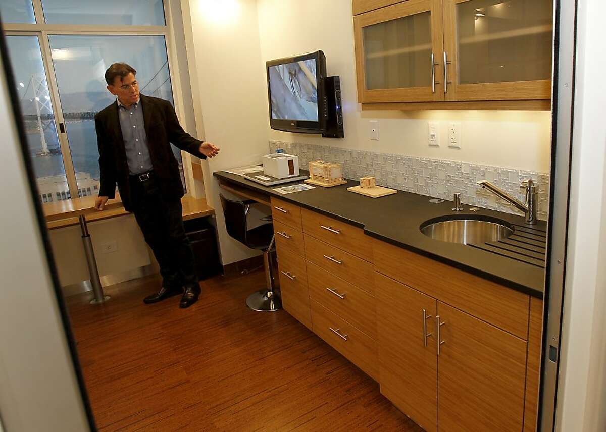 Developer Patrick Kennedy in the living area of his SmartSpace unit. Developer Patrick Kennedy has built a prototype micro-apartment in a Berkeley storage warehouse. He is building similar units in San Francisco. Tiny apartments, the size of two Airstream trailers, could be the wave of the future in San Francisco, Calif. if supervisors approve a resolution to shrink the legal apartment size.