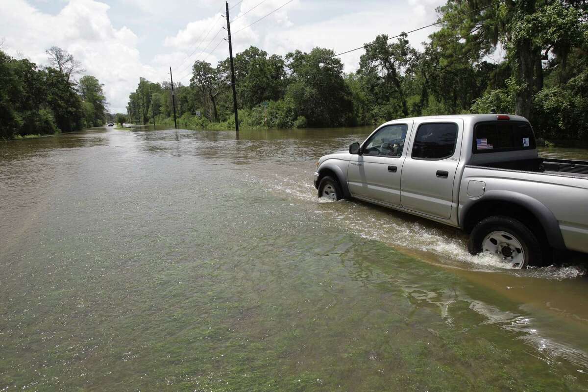 Endless rains flood Cypress Creek, snarl traffic, bring power outages
