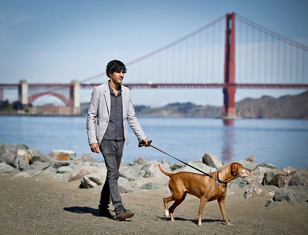 Jeremy Stoppelman, co-founder and CEO and Director of Yelp, the crowd-sourced review site, is seen at Crissy Field with his dog, Darwin, on Tuesday, June 26, 2012 in San Francisco, Calif.