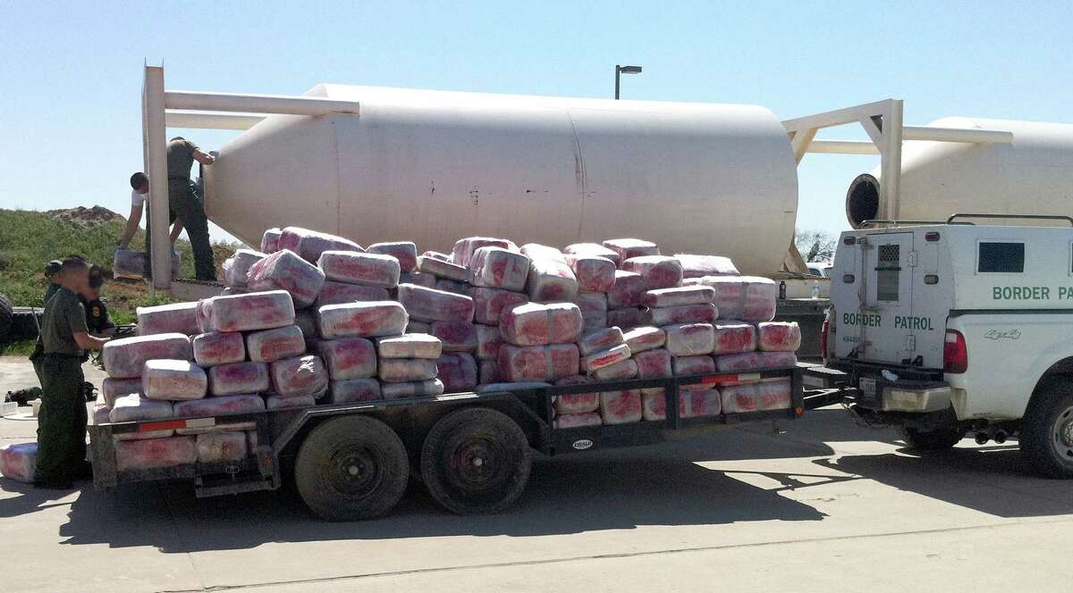 U.S. Border Patrol agents in March discovered a record 18,665 pounds of marijuana stashed aboard two trucks heading down a private ranch road.