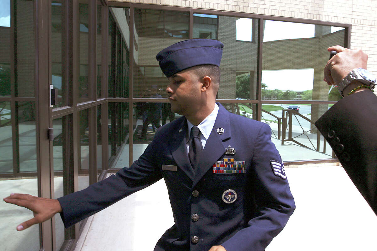 U.S. Air Force Staff Sgt. Luis A. Walker arrives from a lunch break during his court martial at Lackland Air Force Base, Monday, July 16, 2012. Walker, a former training officer, is charges with illicit sexual contact with 10 female trainees. He is facing 28 counts including rape and is one of 12 instructors under investigation.