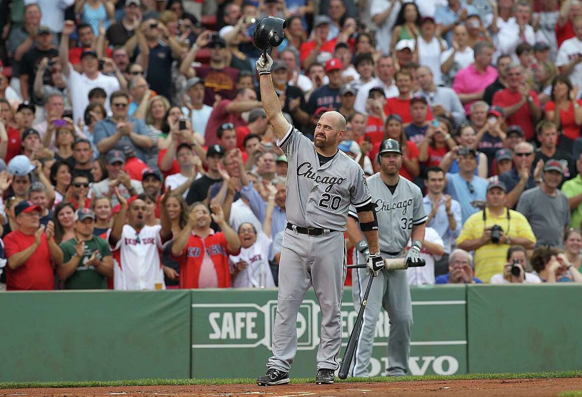 The White Sox's Kevin Youkilis acknowledges the fans before his first at-bat against the Red Sox, his former team, Monday night at Fenway Park.