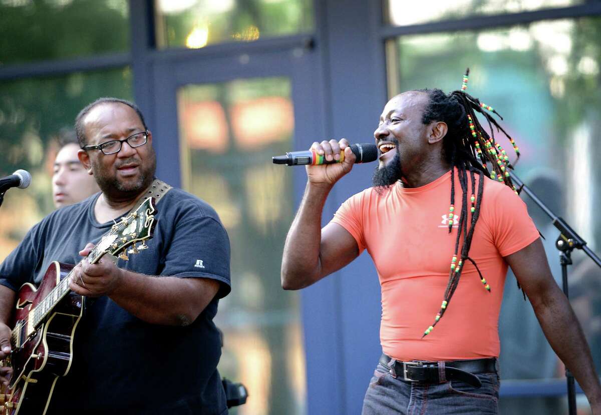 Mystic Bowie (right) and band, with special guest Renard Boissiere (left) perform at the SoNo Charity Concert series at 50 Washington Street, Norwalk Ct. Thursday July 12th, 2012.