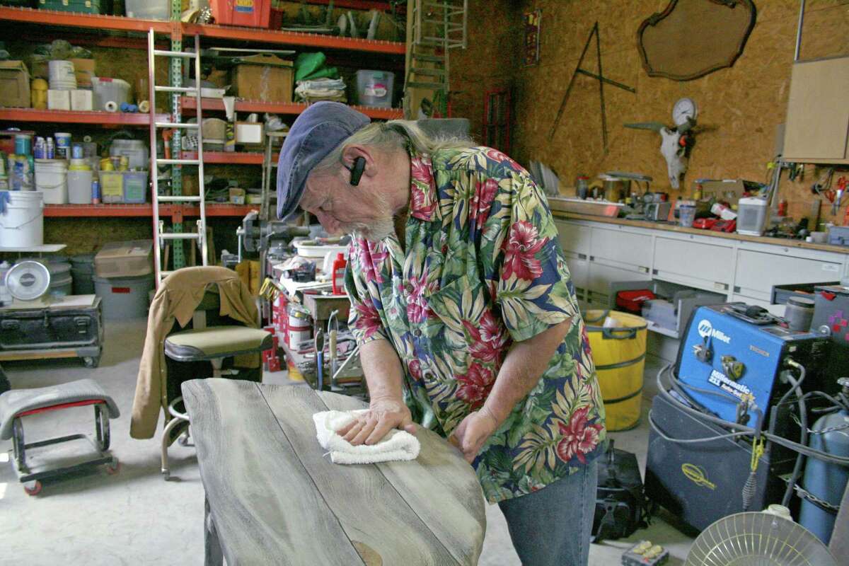 Donald Tucker, 67, creates art using an old-time technique in which cement is made to resemble wood.