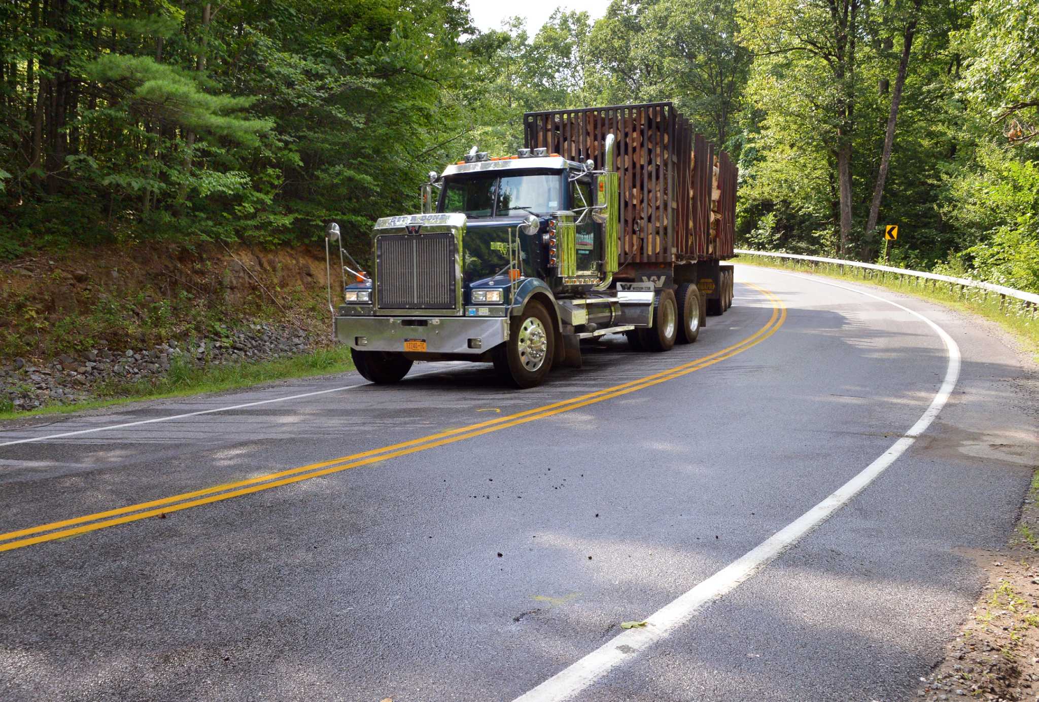 1 dead after motorcycle hits truck
