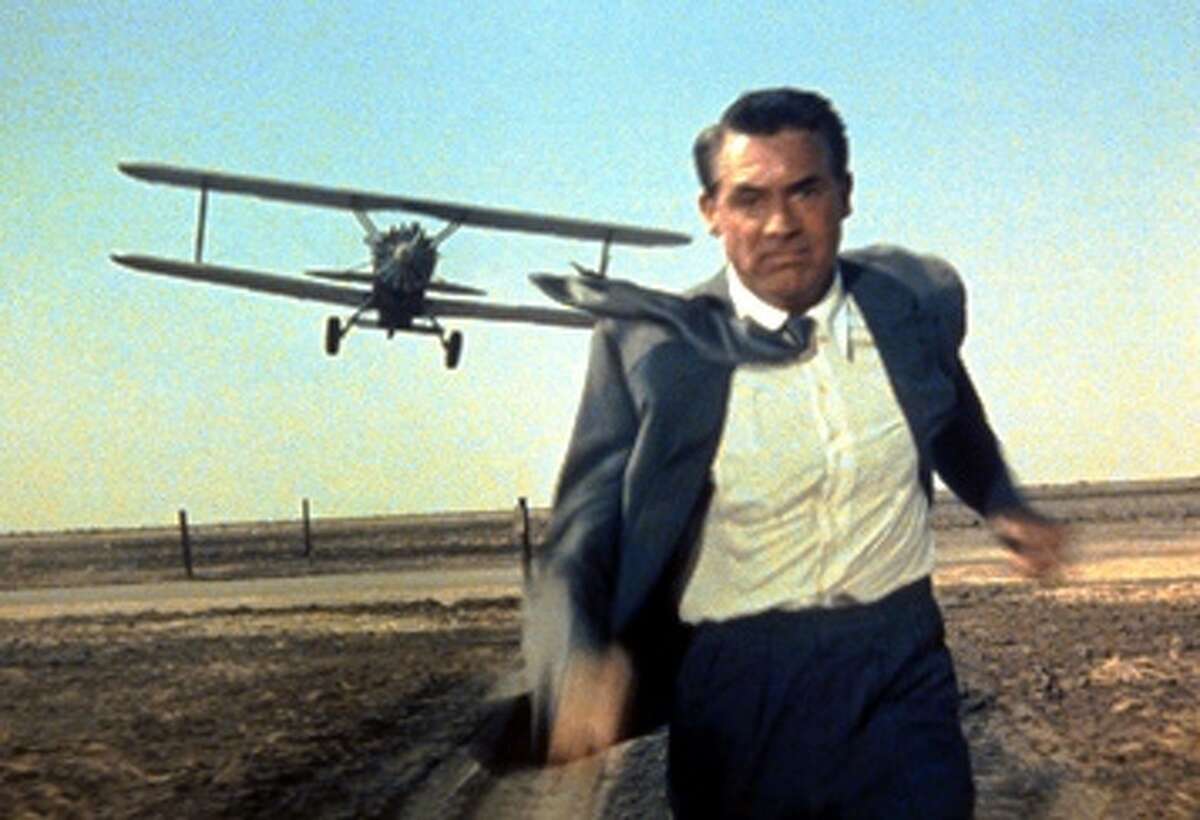 "North By Northwest" (1959): Cary Grant is on the run from a crop duster in a scene from Hitchcock's tale of mistaken identity.