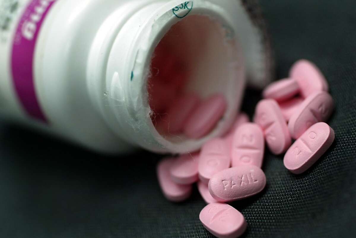MIAMI, FL - FILE: A bottle of anti-depressant pills named Paxil are shown March 23, 2004 photographed in Miami, Florida. It was reported on July 2, 2012 that pharmaceutical company GlaxoSmithKline will plead guilty with Justice Department and pay $3 billion in the largest settlement of health care fraud in U.S. history. The company is to plead guilty to a three-count criminal information, including two counts of introducing misbranded antidepressant drugs Paxil and Wellbutrin to interstate commerce and one count of failing to report safety data about the diabetes drug Avandia to the FDA. (Photo Illustration by Joe Raedle/Getty Images)