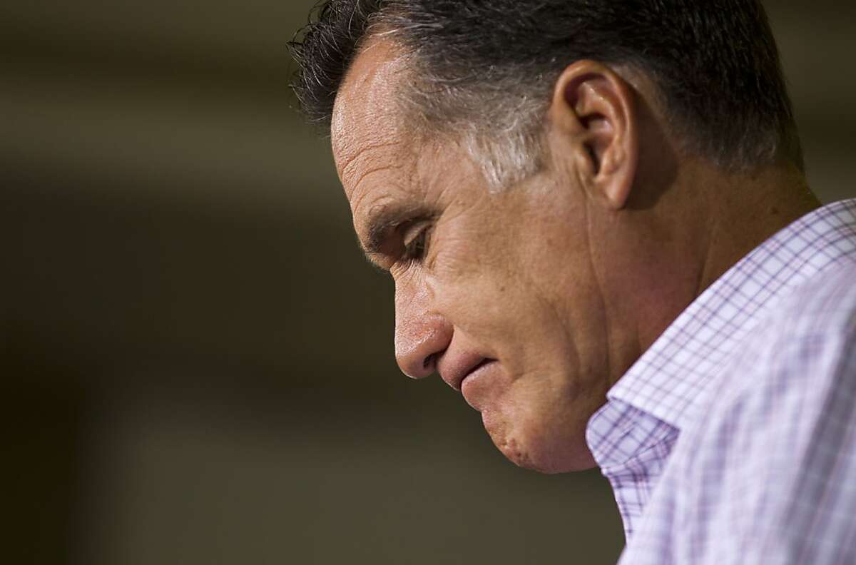 Republican presidential candidate, former Massachusetts Gov. Mitt Romney pauses during a campaign event at Horizontal Wireline Services on Tuesday, July 17, 2012 in Irwin, Pa. (AP Photo/Evan Vucci)