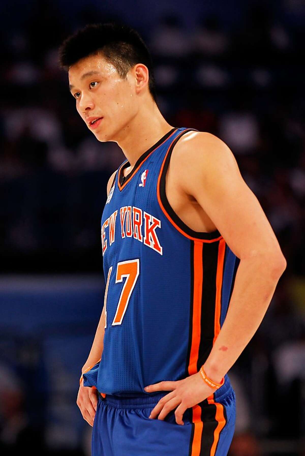 FILE - JULY 17: According to reports July 17, 2012, the negotiations between Jeremy Lin and the New York Knicks has ended and he is expected to sign with the Houston Rockets. ORLANDO, FL - FEBRUARY 24: Jeremy Lin #17 of the New York Knicks and Team Shaq looks on during the BBVA Rising Stars Challenge part of the 2012 NBA All-Star Weekend at Amway Center on February 24, 2012 in Orlando, Florida. NOTE TO USER: User expressly acknowledges and agrees that, by downloading and or using this photograph, User is consenting to the terms and conditions of the Getty Images License Agreement. (Photo by Mike Ehrmann/Getty Images)